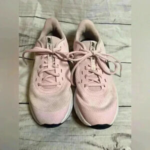 Nike revolution pink running shoes